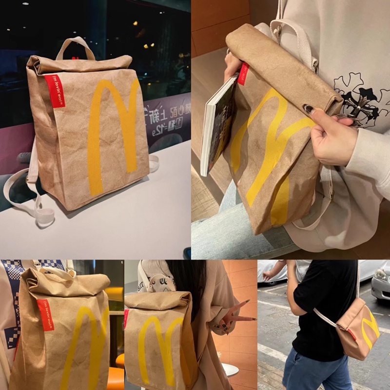 ▧Sera McDonald s schoolbag paper bag backpack women s backpack tas berkapasitas besar mahasiswa kelas rekreasi buku merah kecil dengan paragraf yang sama