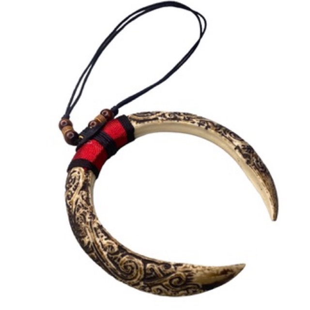 kalung taring sepasang replika taring babi ukir