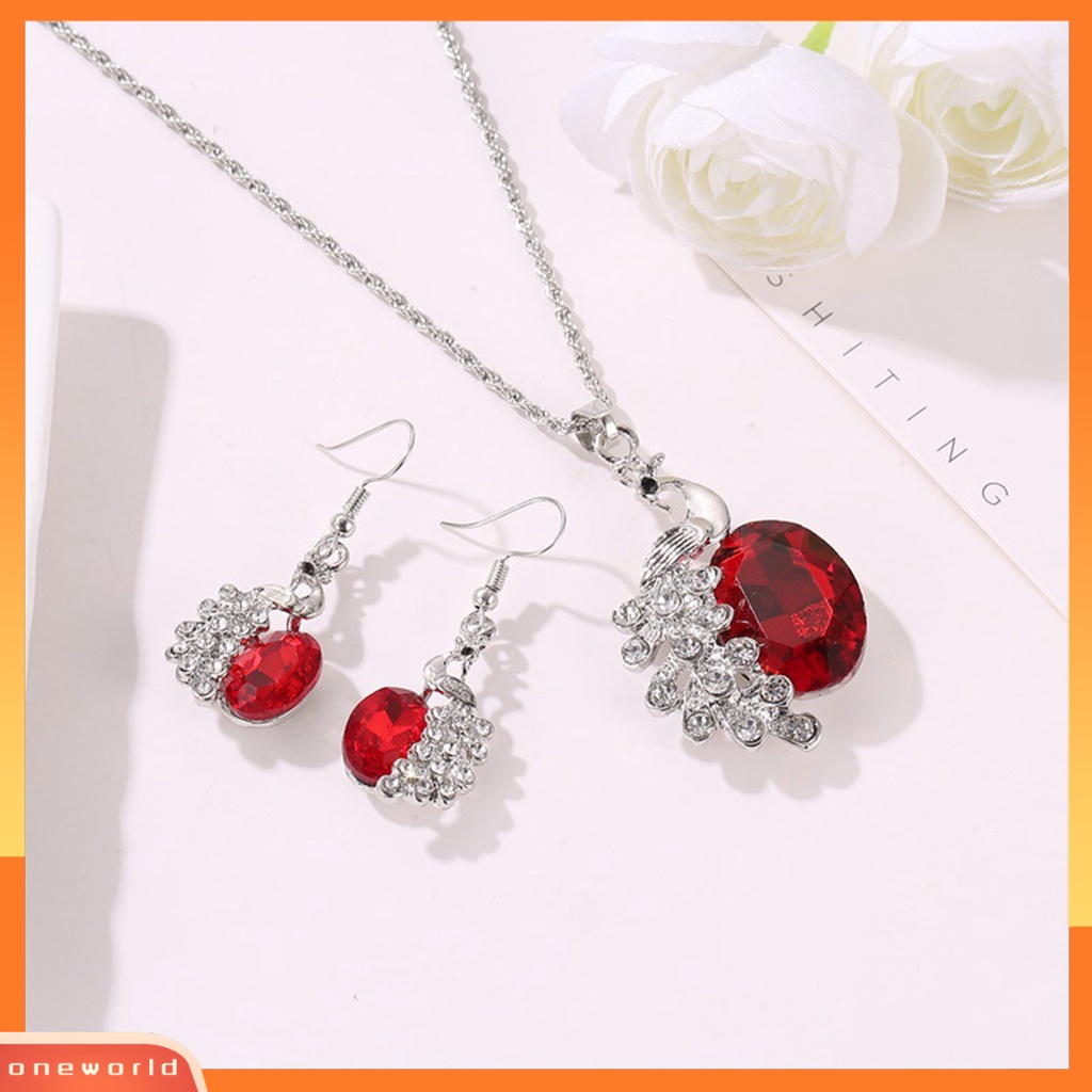 [ONE] 2pcs/set Kalung Anting Set Biru Kristal Imitasi Kepribadian Glitter Indah Bentuk Merak Hias Berlian Imitasi Liontin Anting Kalung Perhiasan Aksesori