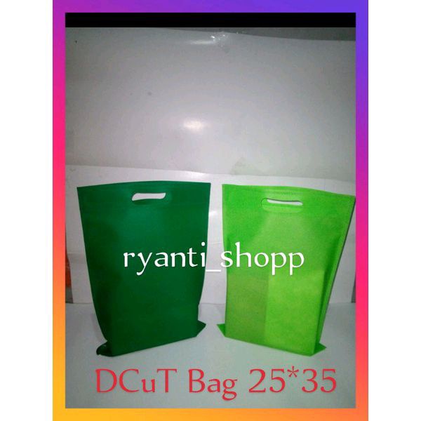 Tas Spunbond 75gsm model Plong/Oval uk25x35 cm / d cut /  spunbond / Plong / kain / press / kantong / Totebag / goodie / souvenir