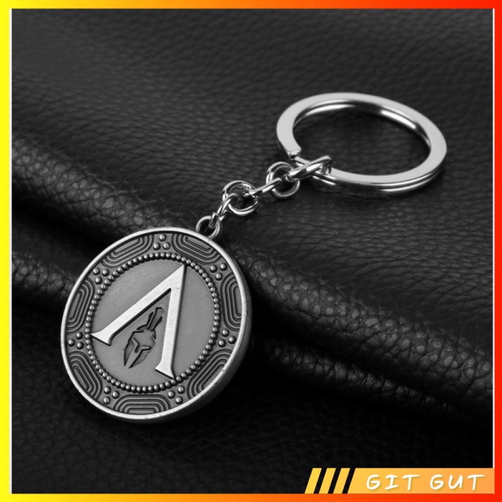 Keychain Gantungan Kunci Assassins Creed Odyssey Logo Symbol