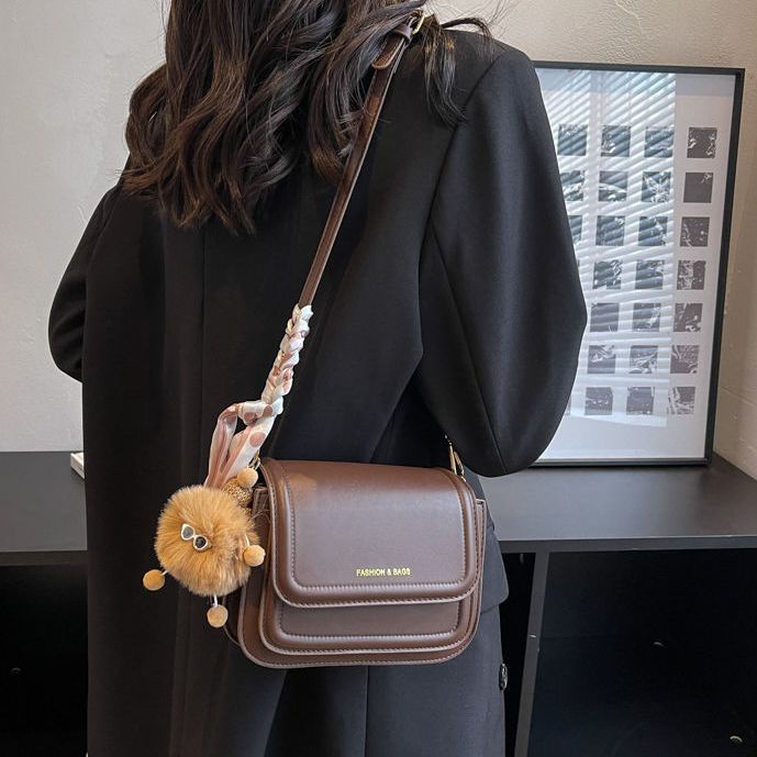 Red High-end sense tas kecil wanita populer tahun ini 2022 musim gugur dan musim dingin tas baru multi-layer kompartemen all-match tas messenger gaya asing