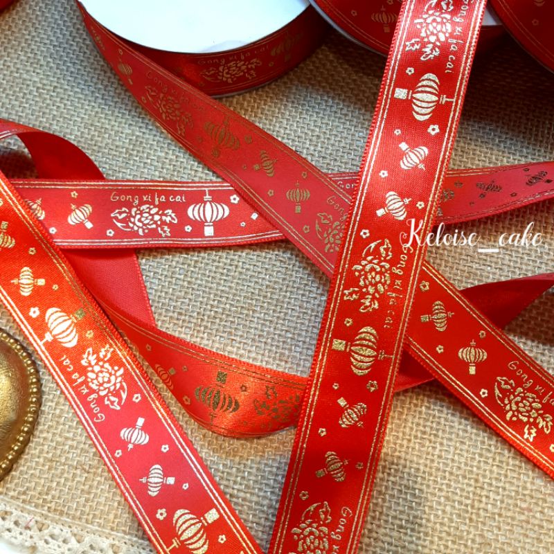 

PITA CNY/IMLEK/SINCIA/CHINESE NEWYEAR SATIN MERAH LEBAR 2,5 CM-20 YARD (import)