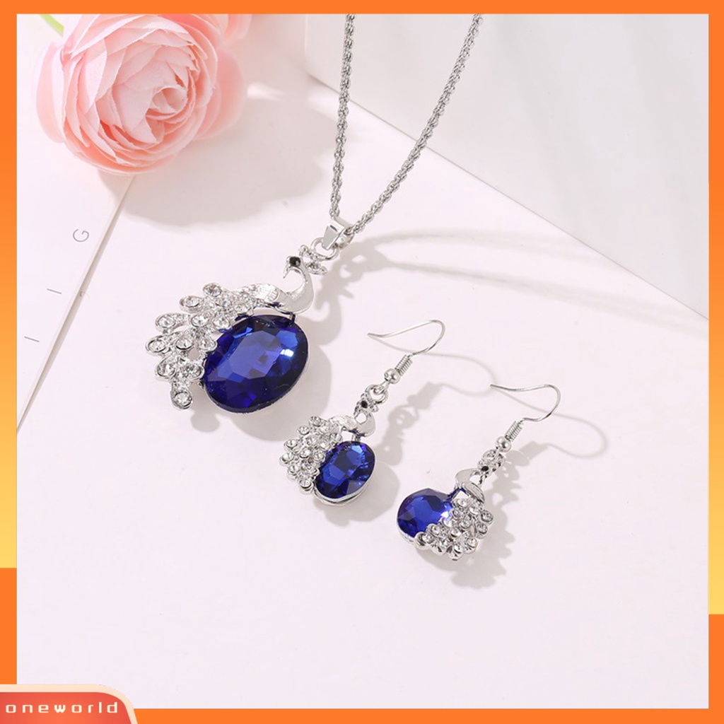 [ONE] 2pcs/set Kalung Anting Set Biru Kristal Imitasi Kepribadian Glitter Indah Bentuk Merak Hias Berlian Imitasi Liontin Anting Kalung Perhiasan Aksesori