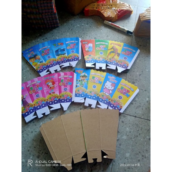 

kertas pop corn bahan kertas craff 1pack isi 1000 lembar ukuran 6x12 ,10 gambar campur