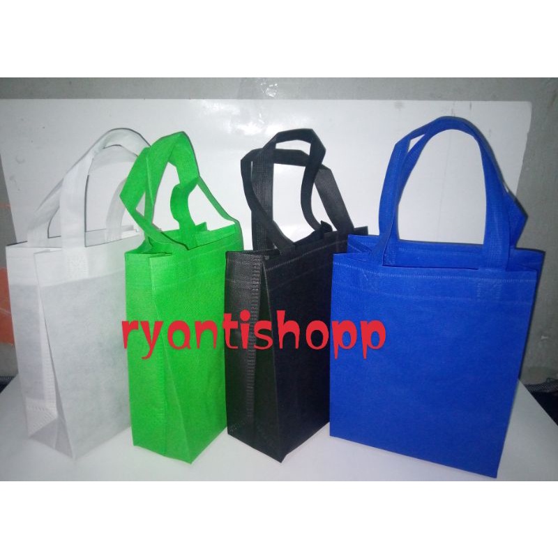 Tas Spunbond 75gsm model bok bag UK (20x25x9cm) dengan 2 lipatan samping dan bawah / tote bag