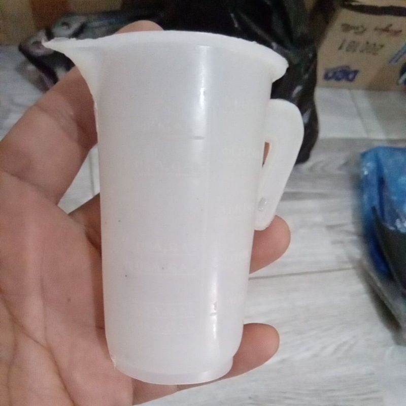 cangkir takaran oli samping motor