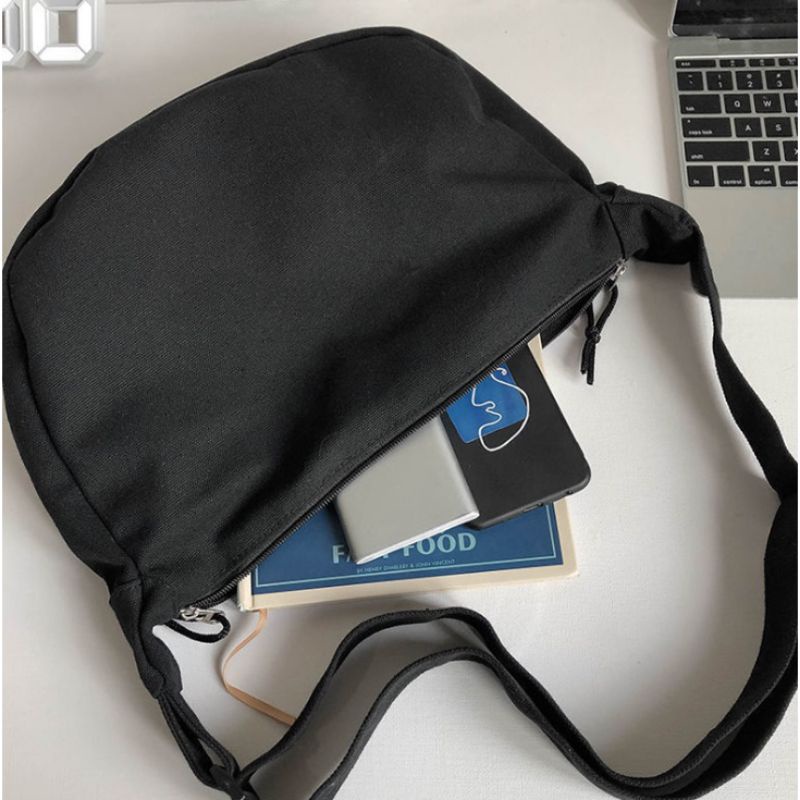 garansi tas selempang pria wanita murah bahan kanvas muat banyak barang tas