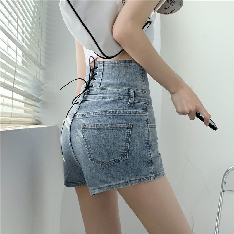 Red Musim Panas Gaya Baru Super Tinggi Pinggang Denim Tie Tali Celana Pendek Wanita Versi Korea Longgar Kaki Lebar Pelangsing All-Match Berkancing a-line Hot Pants