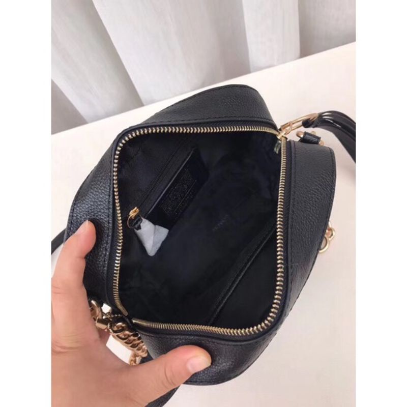 co@ch camera in signature crosbody