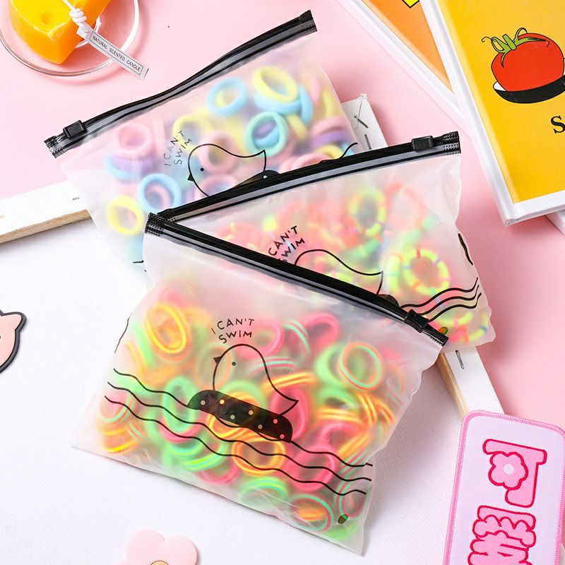 (100 pcs) Ikat rambut donut korea free pouch