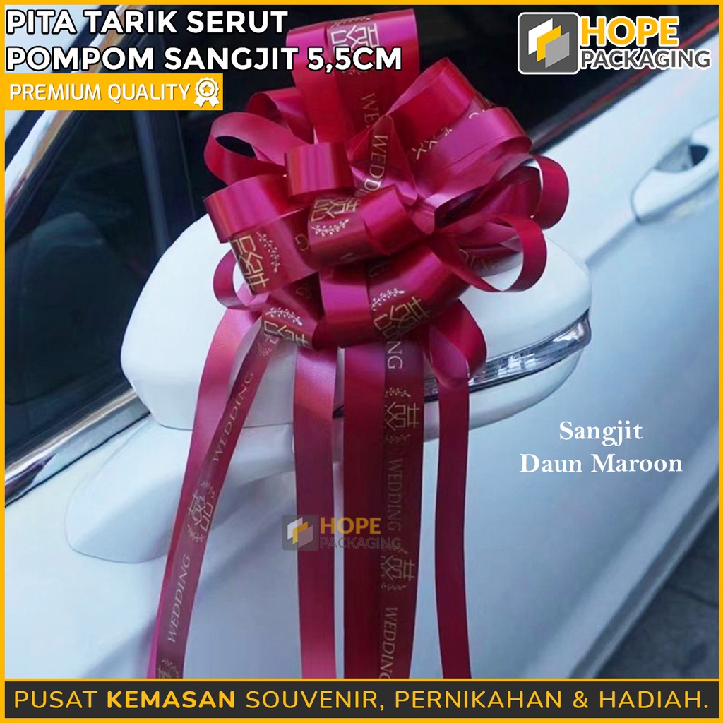 

Pita Tarik Serut Pompom Sangjit Bulat Jumbo 5.5 cm/ Pita Hampers Parcel Wedding/ Hadiah Kado Pernikahan/ Pita Mobil