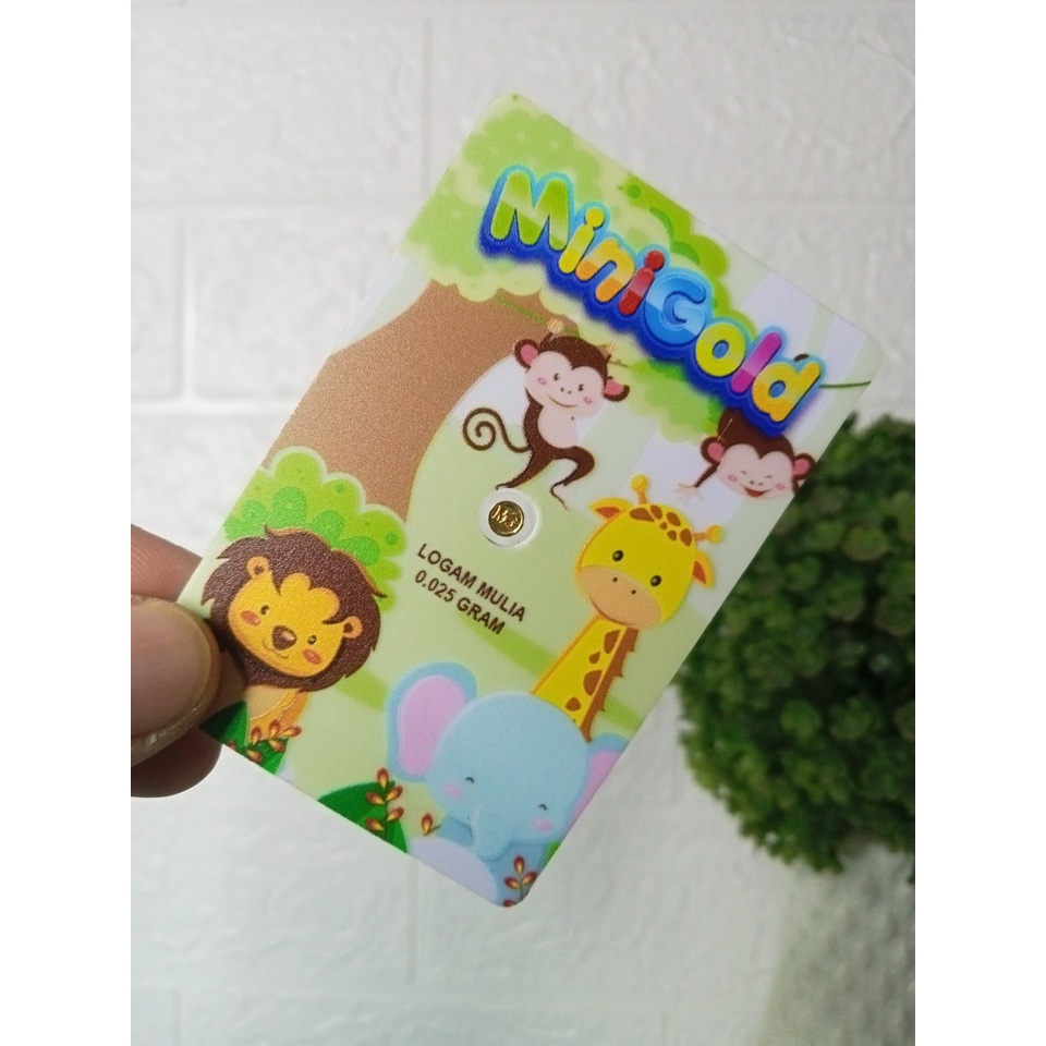 MINIGOLD Gift Series 0.025 Gram Kids Lion Kemasan PVC TERMURAH TERLARIS Emas Mini Emas Batangan Logam Mulia Murni 24 Karat Bersertifikat Resmi Asli Original Tabungan Emas Souvenir Keren Mewah