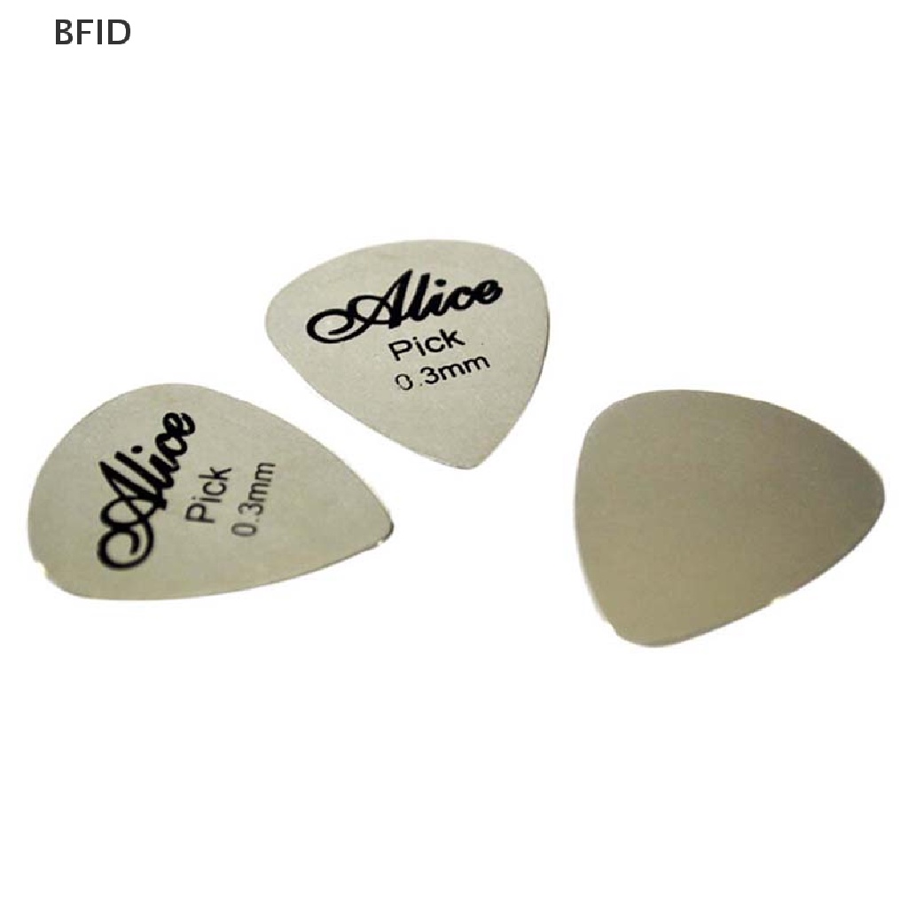 [BFID] Pick Gitar Metal 0.3mm Tipis Untuk Pemula Dan Profesional Bass Ukelele Guitar Picks  Pick Gitar Metal 0.3mm Tipis Tahan Lama Warna Silver Bass Profesional Ukelele Guit