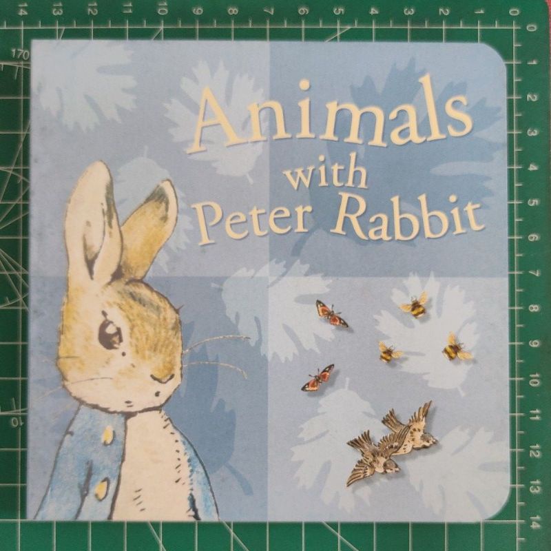 Animals with peter rabbit. board book