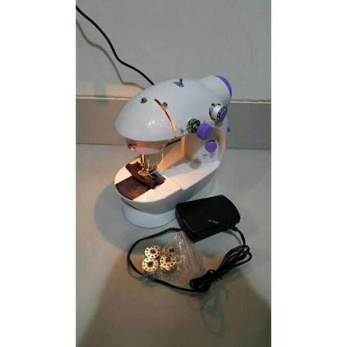 SM- Mesin Jahit Mini Portable Elektrik Harga Murah lo
