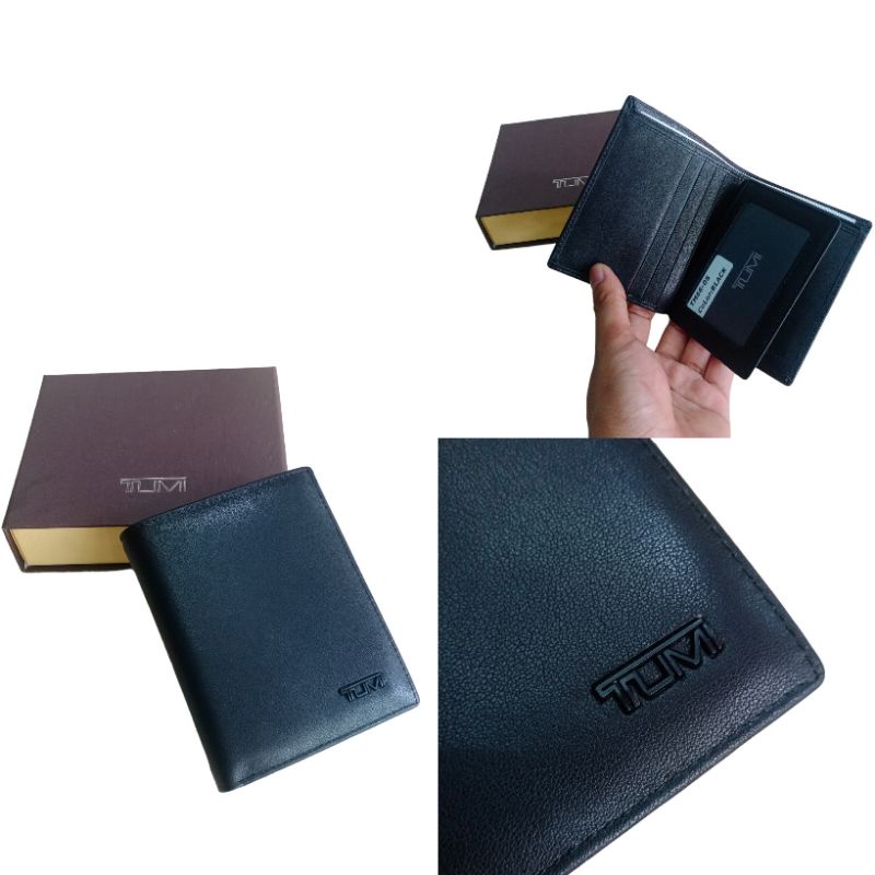 dompet pria kulit tumi berdiri