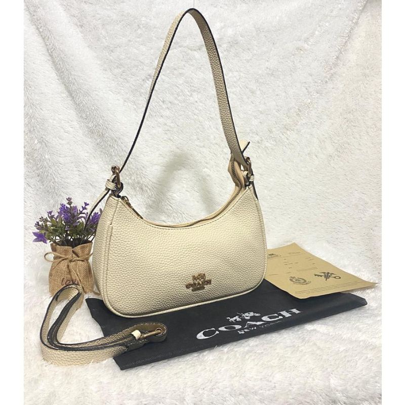 COACHH CLEO HOBO BAILEY TOP HENDLE IN SIGNATURE KULIT JERUK