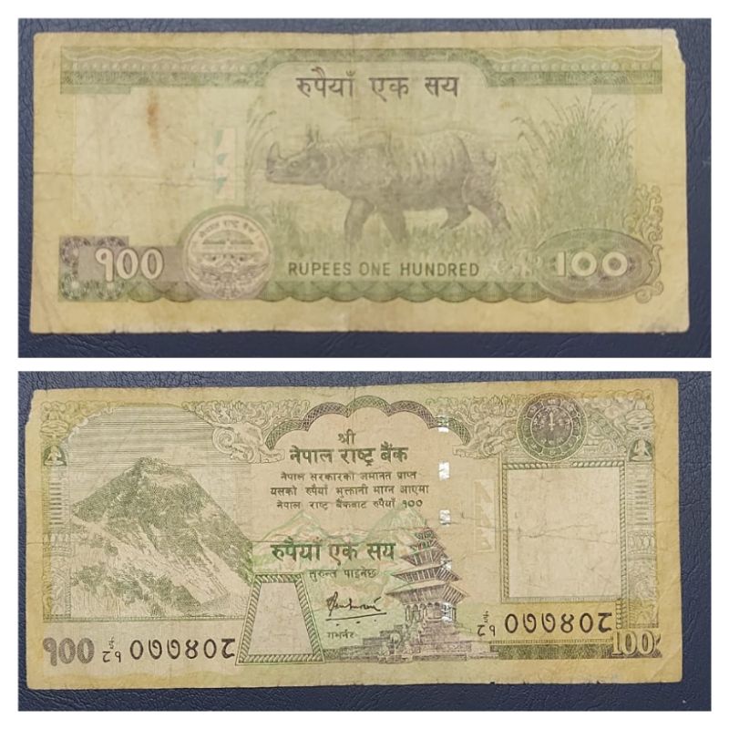 Uang Negara Nepal 100 Rupe  2002 Series Badak kondisi VF Dijamin Original 100%