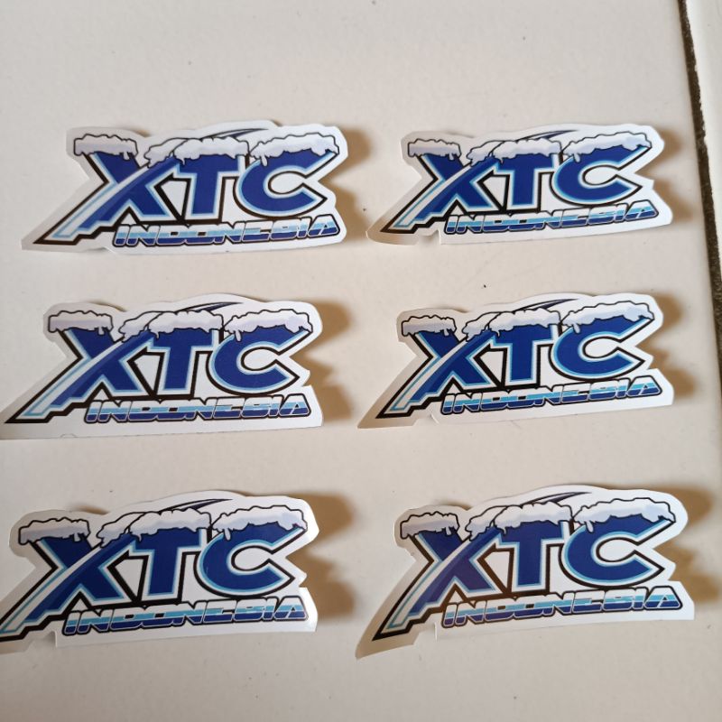 

Stiker logo isi enam pcs anti air Promo xtc indonesia