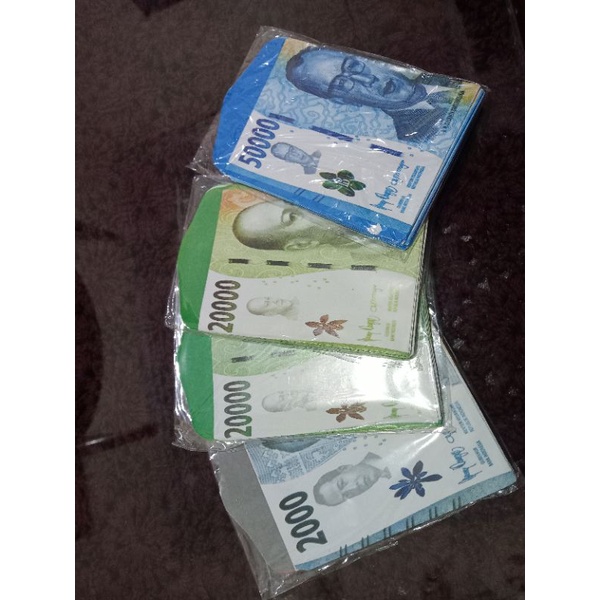 

Amplop Lebaran Motif Uang