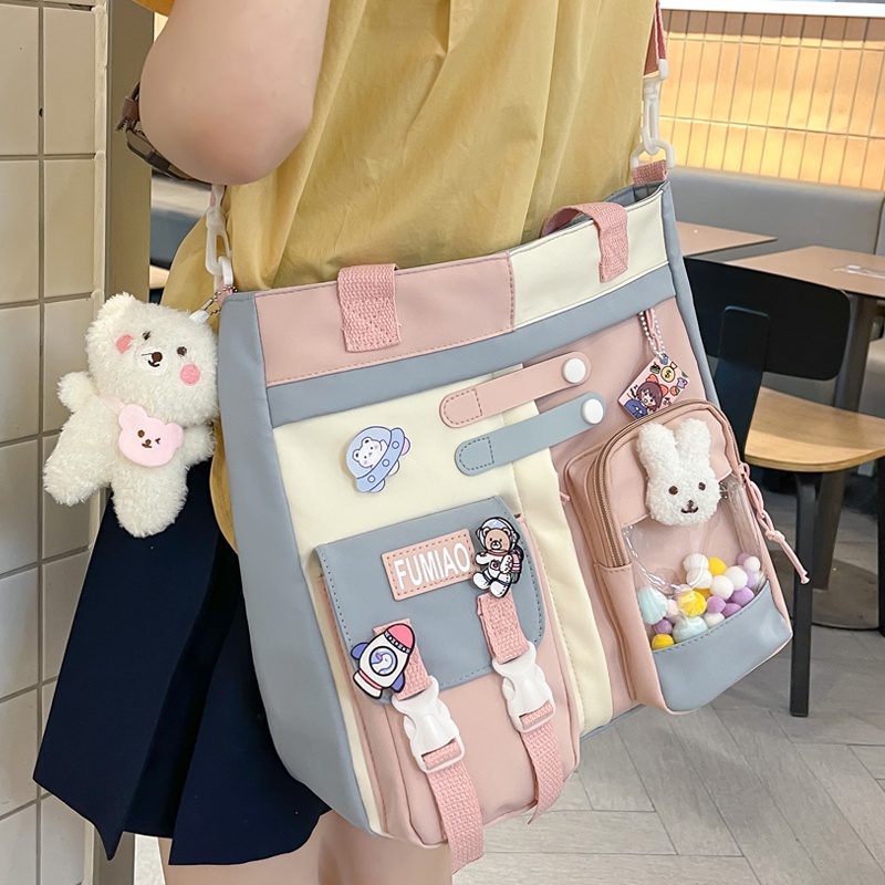 ﹍♈Sera midpoint tas kanvas siswa sekolah dasar perempuan membawa tas buku sekolah menengah kelas perempuan tas sekolah bahu fashion lucu Messenger tas