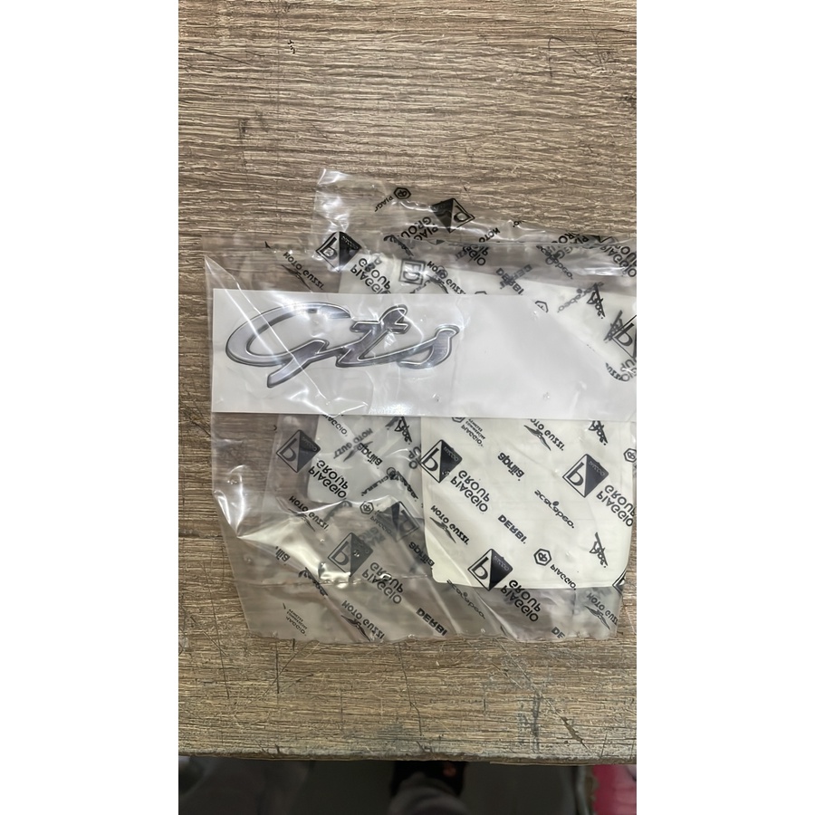 Sparepart Vespa Emblem sticker GTS body samping Original