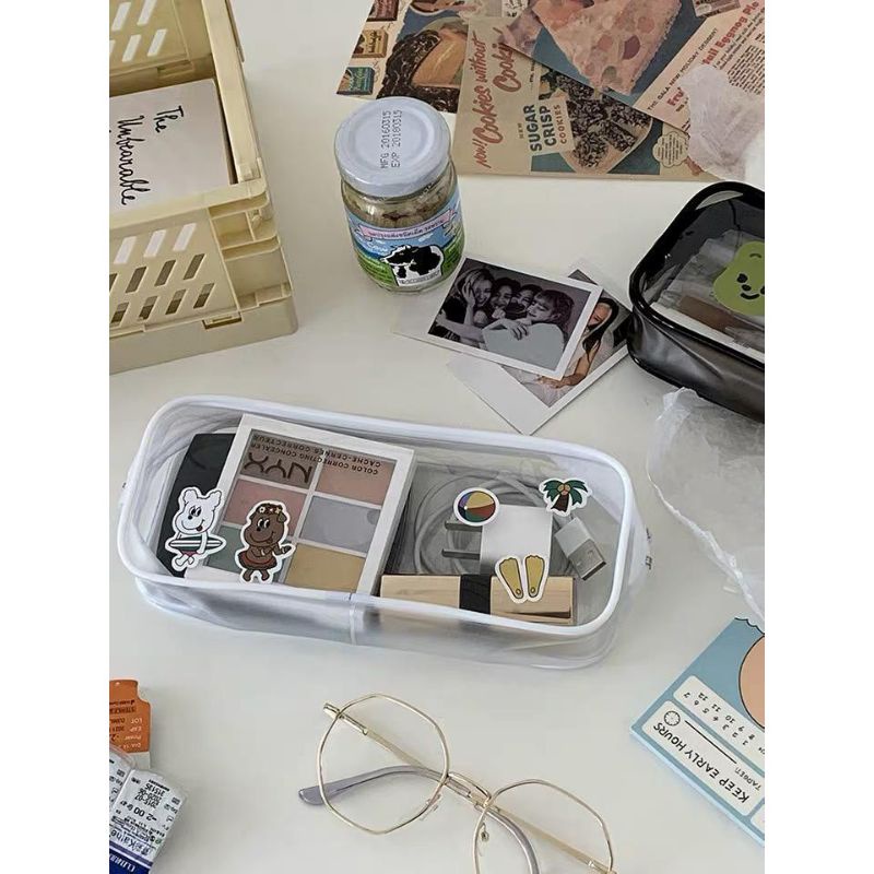 

Tempat pensil transparan list putih/hitam cod