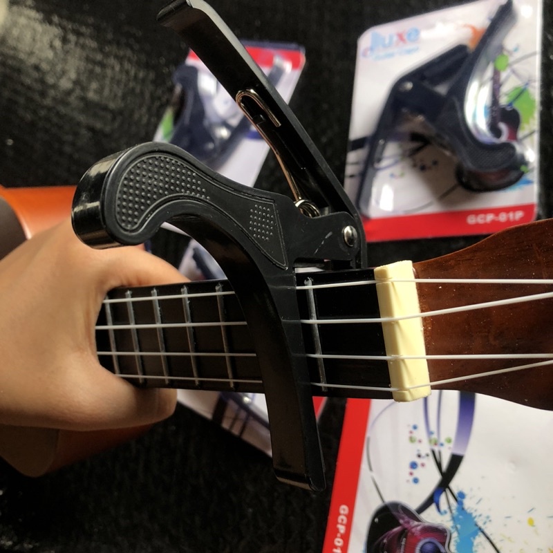 Capo Gitar Dluxe penjepit gitar / ukulele