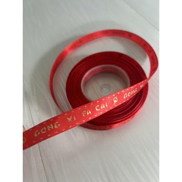 

Pita Imlek Gong xi fa cai Pita Satin Merah