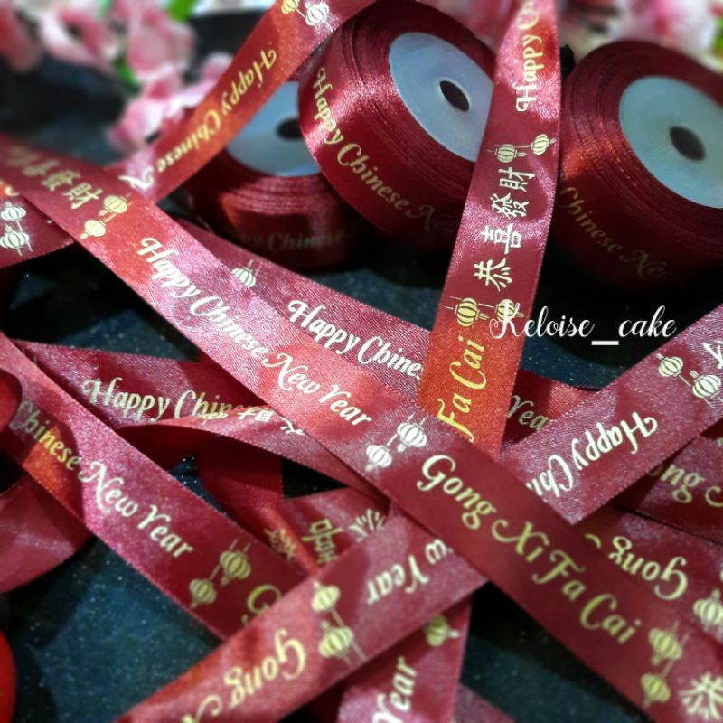 

PITA SATIN MERAH MAROON CNY/SINCIA/IMLEK/CHINESE NEW YEAR UKURAN 2,5 CM-18 METER