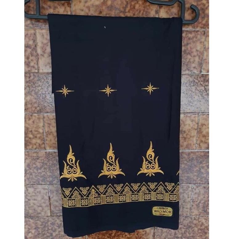 "PCI.20Ja23ᶻ" sarung bordir warna hitam,benang kuning dan putih motip gayo besar