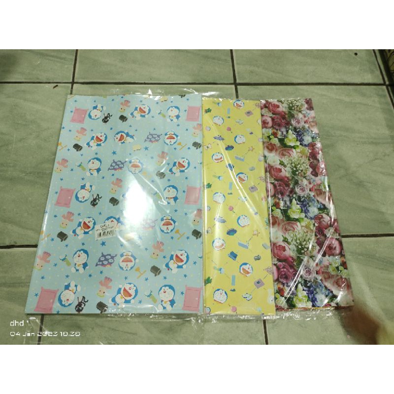 

Kertas kado 1 pak isi 50