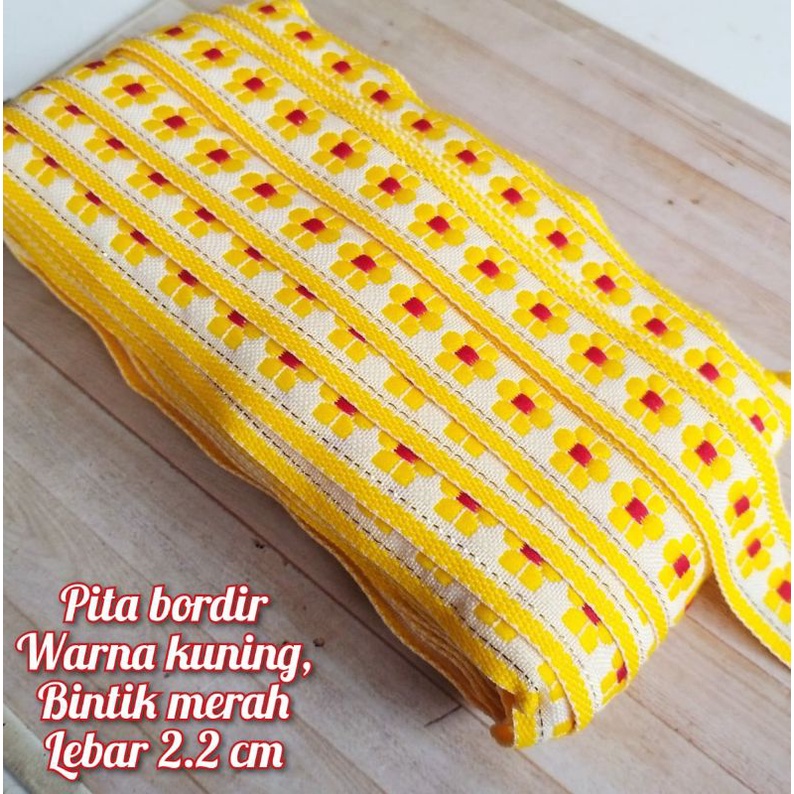 

per meter,pita bordir warna kuning lebar 2.2 cm