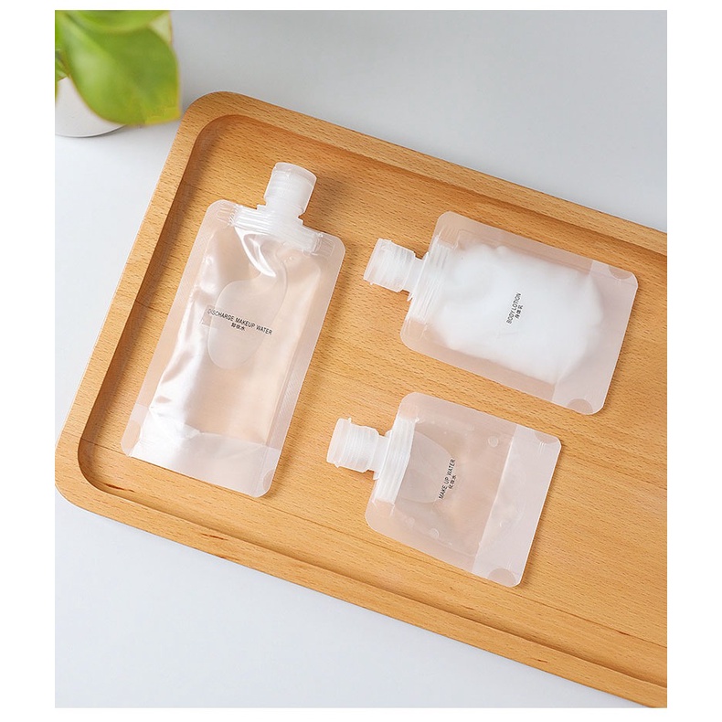 Travel Dispenser Tas Kosmetik Lotion Shower Gel Sampo Travel Portabel Wajah Kecil Sekali Pakai