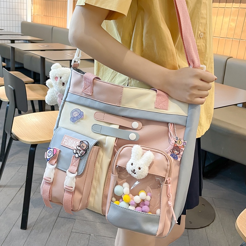 ﹍♈Sera midpoint tas kanvas siswa sekolah dasar perempuan membawa tas buku sekolah menengah kelas perempuan tas sekolah bahu fashion lucu Messenger tas