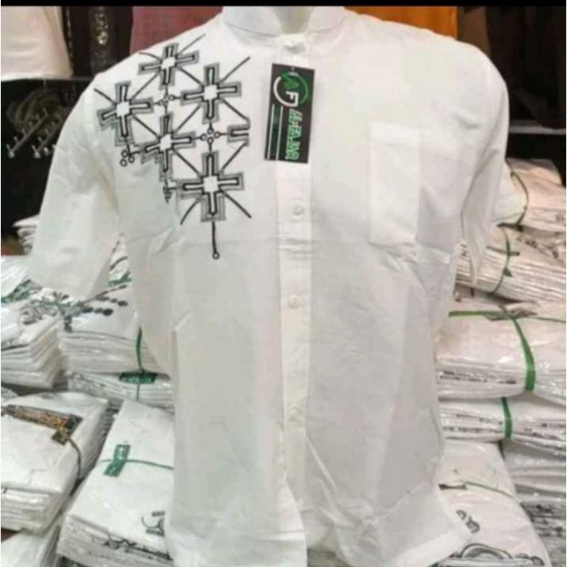 Baju taqwa/koko putih bordir lengan panjang.