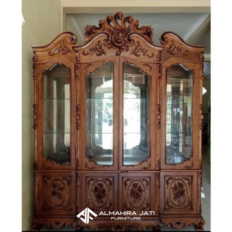 LEMARI KACA HIAS KAYU JATI SERBAGUNA - LEMARI PERABOT JATI SERBAGUNA - LEMARI HIAS KAYU JATI MEWAH