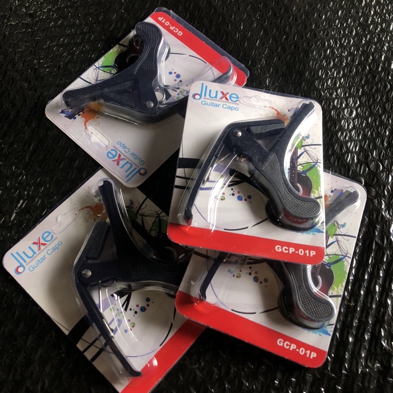 Capo Gitar Dluxe penjepit gitar / ukulele