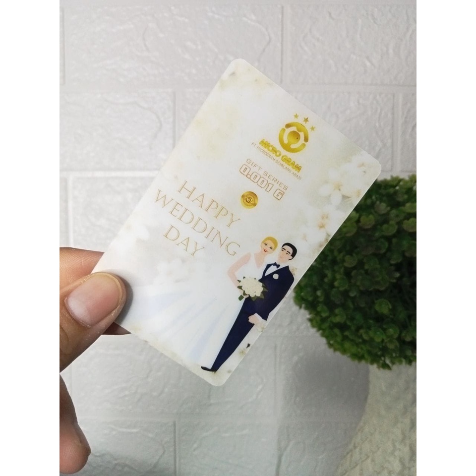 MICROGRAM Gift Series 0.001 Gram HAPPY WEDDING Kemasan PVC TERMURAH TERLARIS Emas Mini Emas Batangan Logam Mulia Murni 24 Karat Bersertifikat Resmi Asli Original Tabungan Emas Souvenir Keren Mewah