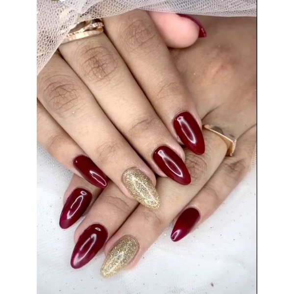 kuku palsu marun gold nail art wedding