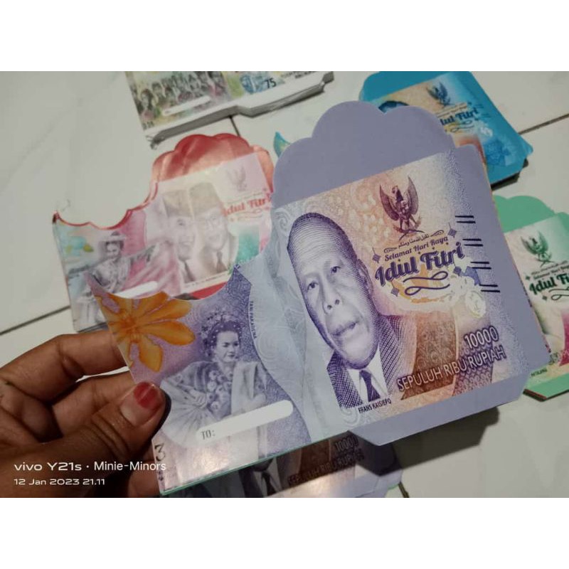 

( 1000 lembar ) Amplop lebaran medium motif uang masih lembaran