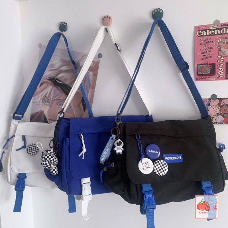 ﹉Sera Messenger bag Klein blue messenger bag yang dapat menampung tas bahu ipad all-match untuk siswa di kelas