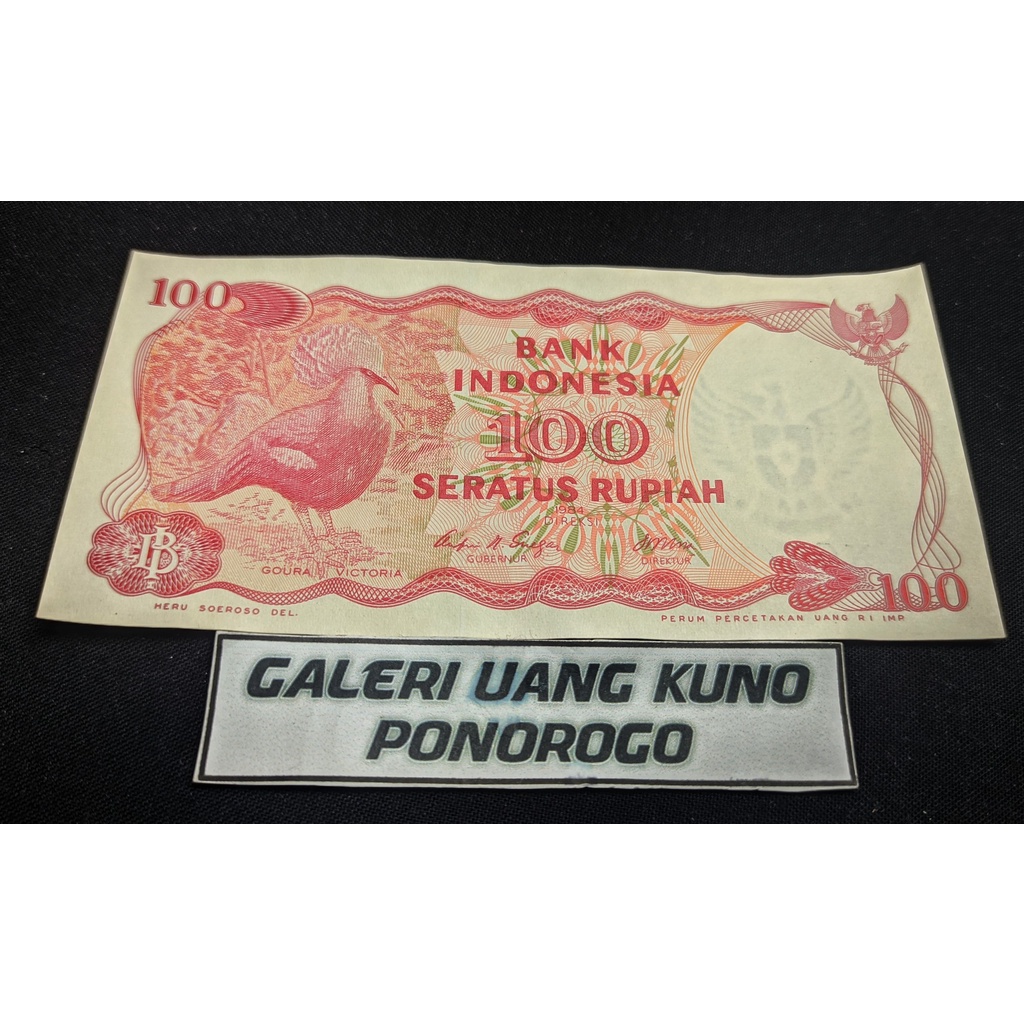 uang 100 rupiah burung seri X