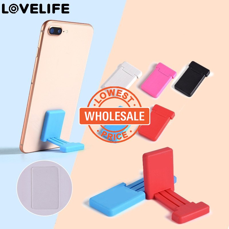 [Harga Grosir]1pc Stand Holder Mini Portabel Universal Bahan Plastik Warna Permen Dapat Ditarik Untuk Smartphone