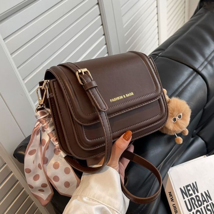 Red High-end sense tas kecil wanita populer tahun ini 2022 musim gugur dan musim dingin tas baru multi-layer kompartemen all-match tas messenger gaya asing