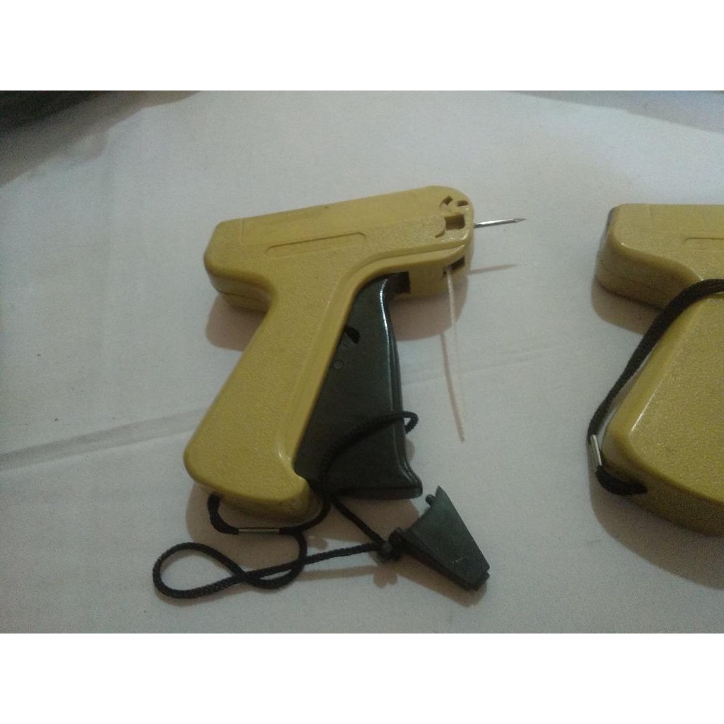 

Alat Tembak Label Pin Harga / Tag Gun + Tag Label Nya