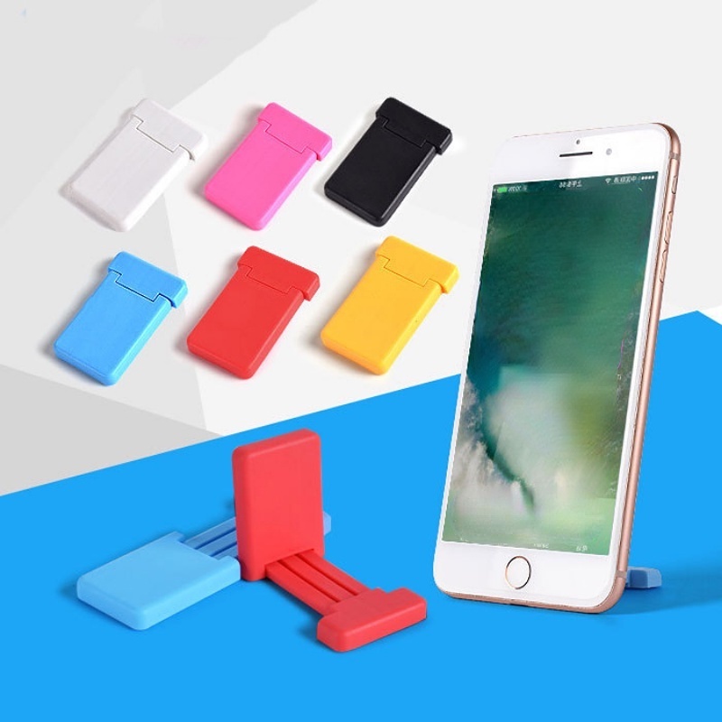 [Harga Grosir]1pc Stand Holder Mini Portabel Universal Bahan Plastik Warna Permen Dapat Ditarik Untuk Smartphone