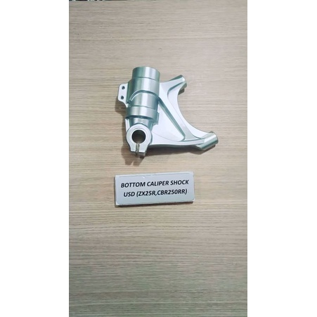 BOTTOM CALIPER SHOCK USD
