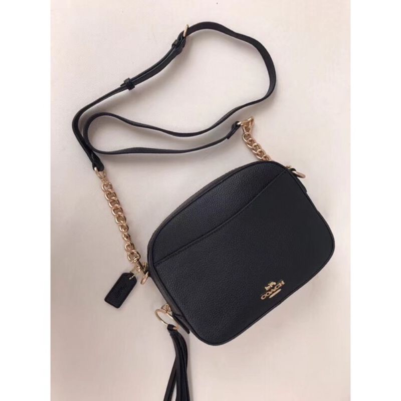 co@ch camera in signature crosbody